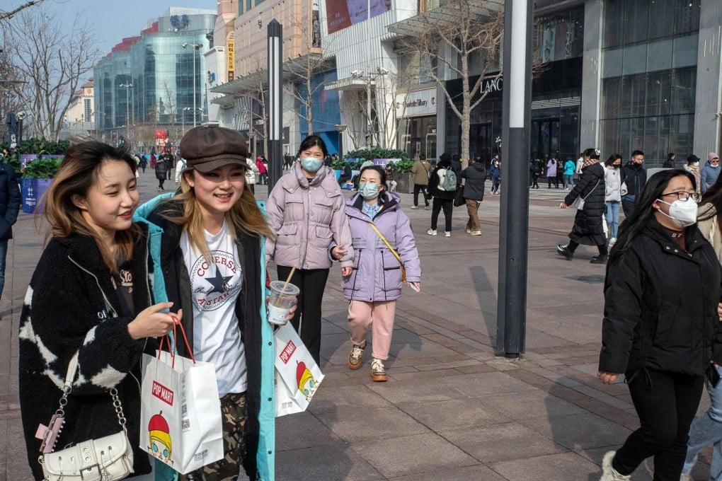 Shoppers in the Wangfujing shopping area in Beijing on February 10. China’s high savings rate and youth unemployment may become stumbling blocks to spending if the economic recovery fails to broaden. Source: Bloomberg