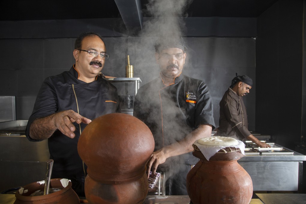 Reji Mathew (left) guides his team at Kappa Chakka Kandhari. Mathew is one of the chefs leading the response to young Indians’ tastes by creating modern twists on old classics. Photo: Kappa Chakka Kandhari