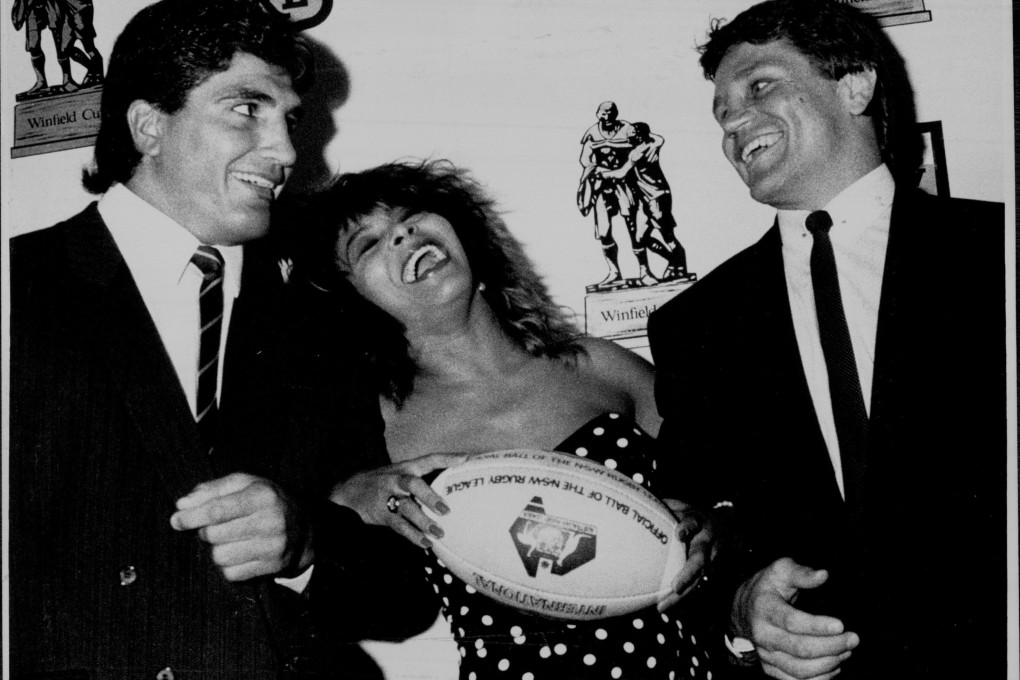 Tina Turner attends a press conference to promote the Australian Rugby League with Wayne Pearce and Mario French in January 1990. Photo: Getty Images