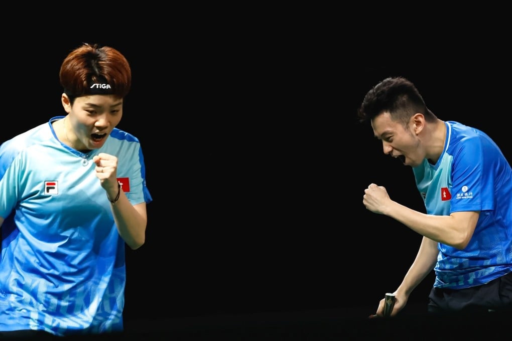 Doo Hoi-kem (left) and Wong Chun-ting clinch a place on the podium as they defeat Swedish pair Truls Moregard and Christina Kallberg. Photo: World Table Tennis