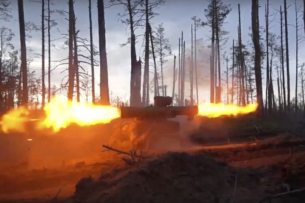 A Russian army soldier fires an anti-tank missile system toward a Ukrainian position in a handout released on Thursday. Photo: Russian Defense Ministry Press Service photo via AP
