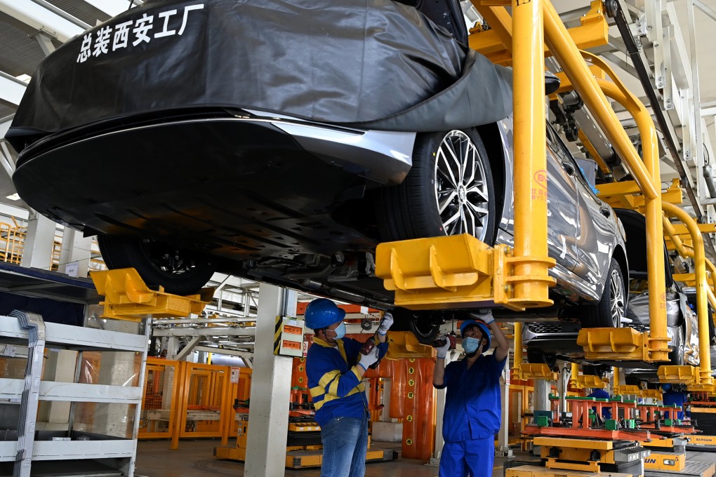 Workers assemble a BYD new energy vehicle at a factory in Xian, Shaanxi province, in April last year. Photo: Xinhua