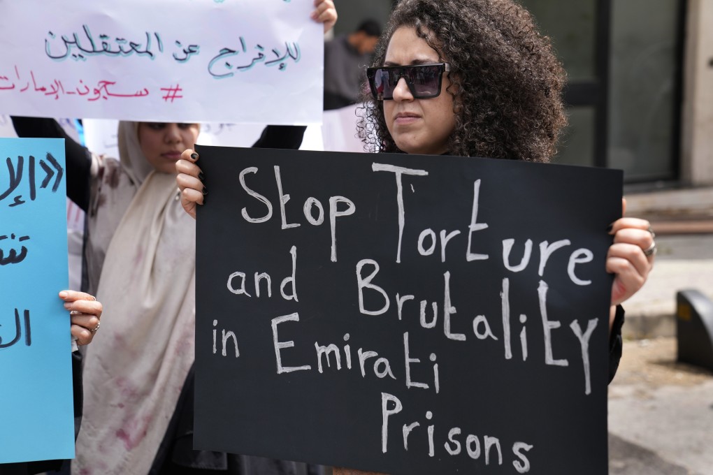 A supporter of Lebanese citizens detained in the United Arab Emirates protests in front of the Foreign Ministry headquarters in downtown Beirut, Lebanon on May 15. The 10 prisoners were freed on Saturday. Photo: AP