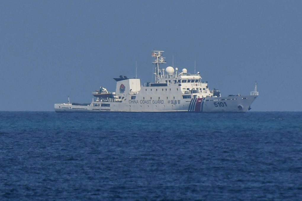 A Chinese coastguard ship patrols near the Philippine-occupied Thitu island in the disputed South China Sea in April 2023. Photo: AFP