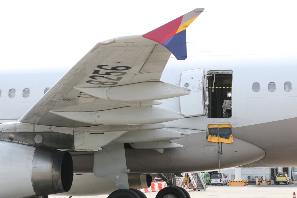 An Asiana Airlines plane is parked after an emergency landing at Daegu airport on May 26. Photo: Yonhap via Reuters