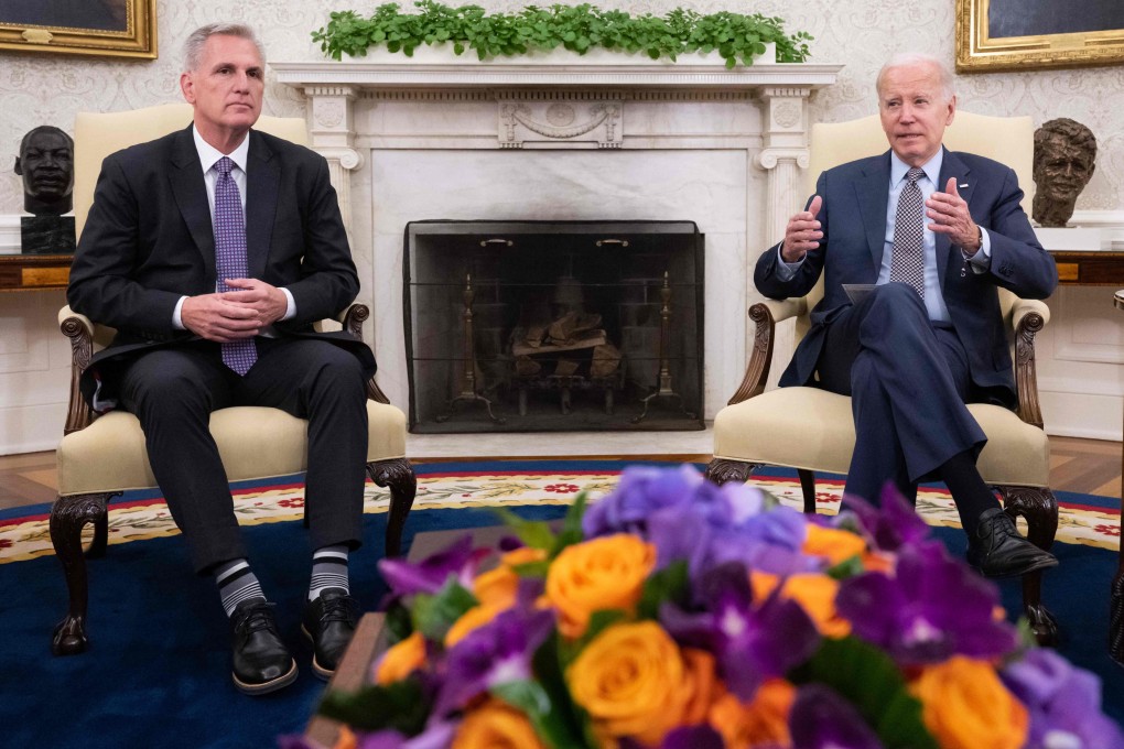 US House Speaker Kevin McCarthy (left) looks on as President Joe Biden speaks during a meeting on the debt ceiling in the Oval Office of the White House in Washington on May 22. Photo: AFP