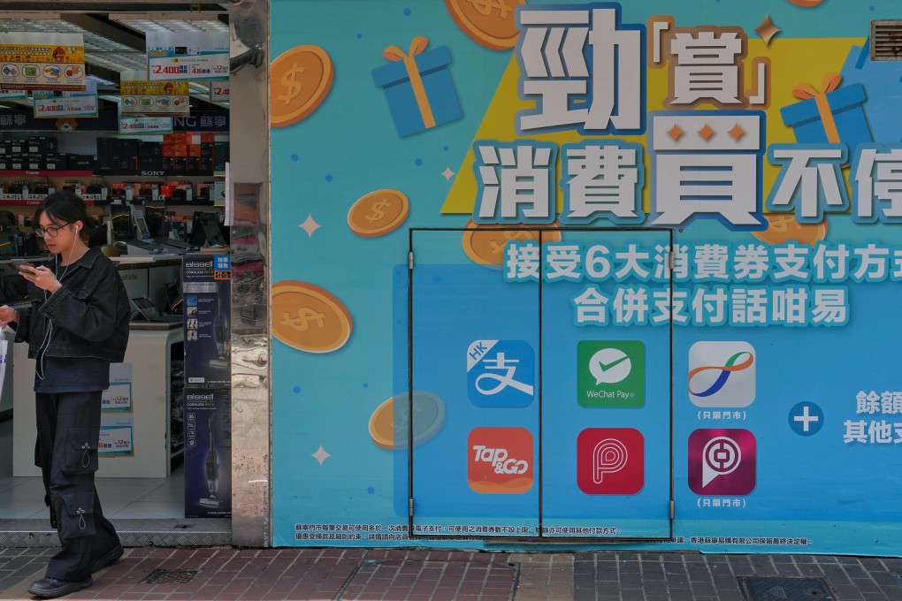 An advertisement featuring the city’s consumption voucher scheme in Mong Kok. Photo: Elson Li