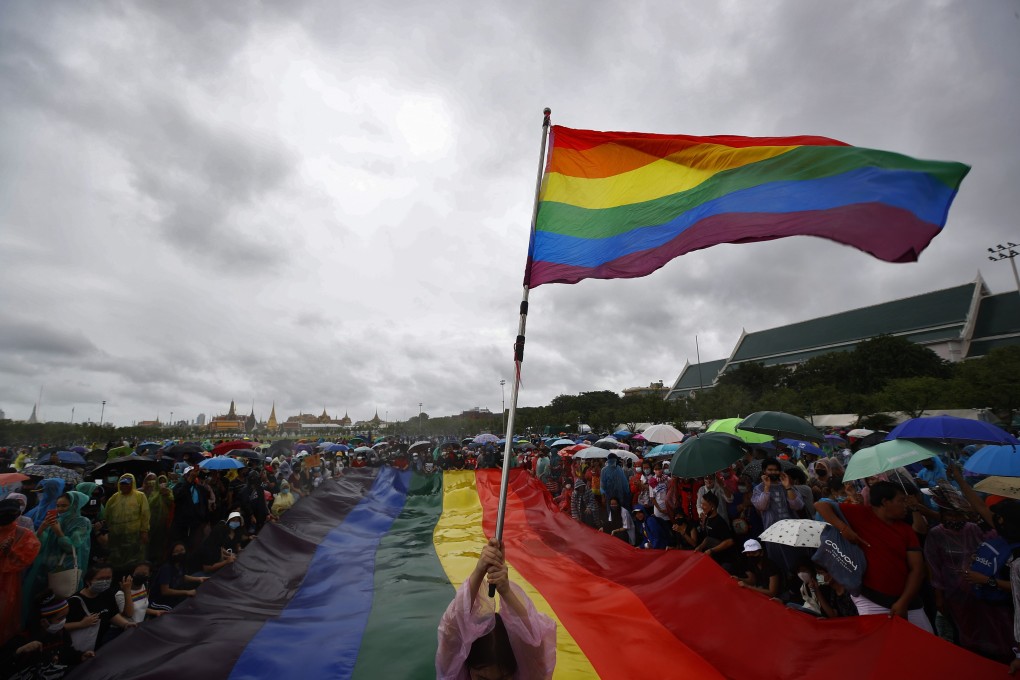 A person waves a rainbow flag during an anti-government protest on September 19, 2020. Photo: EPA-EFE