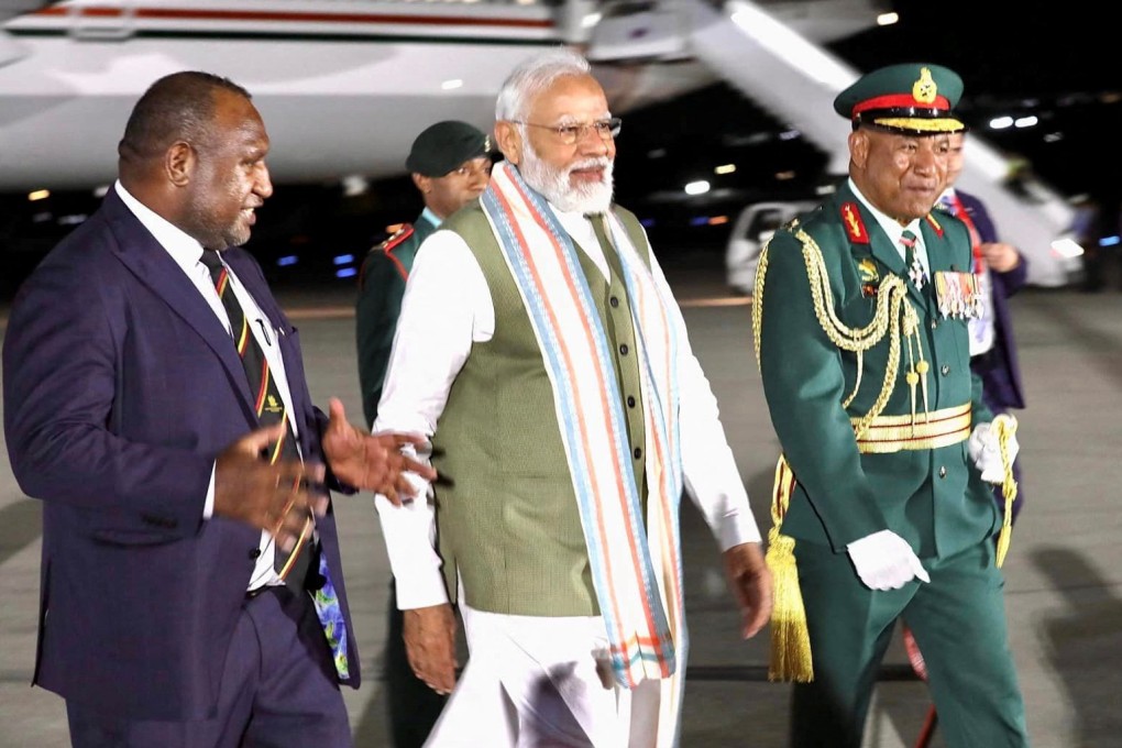 India’s Prime Minister Narendra Modi is greeted by Papua New Guinea Prime Minister James Marape (left) at Jacksons International Airport in PNG on May 21. Photo: Reuters