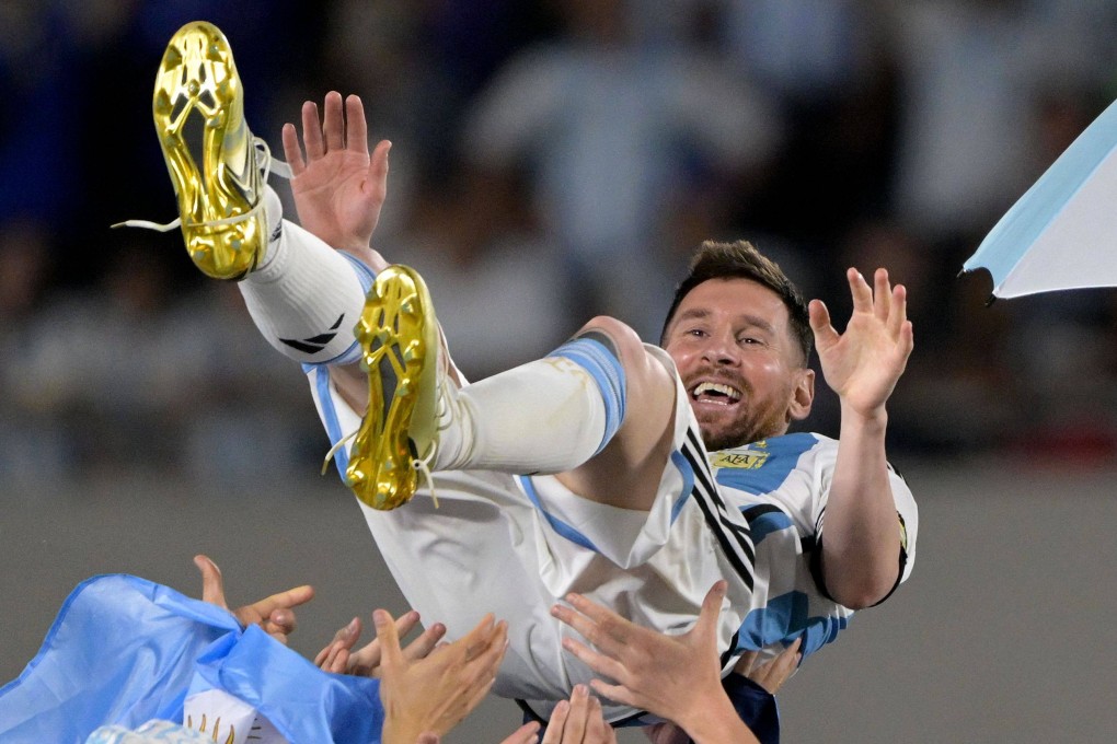 Lionel Messi celebrates winning the World Cup with his Argentina teammates in December. Photo: AFP