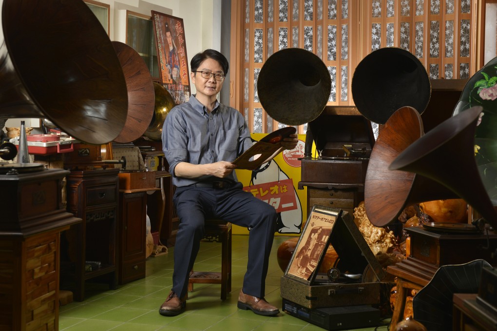 What is arguably China’s most historically significant record collection is owned by Dr Hsu Deng-fang, who sits among some of his treasured items above his dermatology clinic in northern Taiwan. Photo: Chris Stowers/Panos