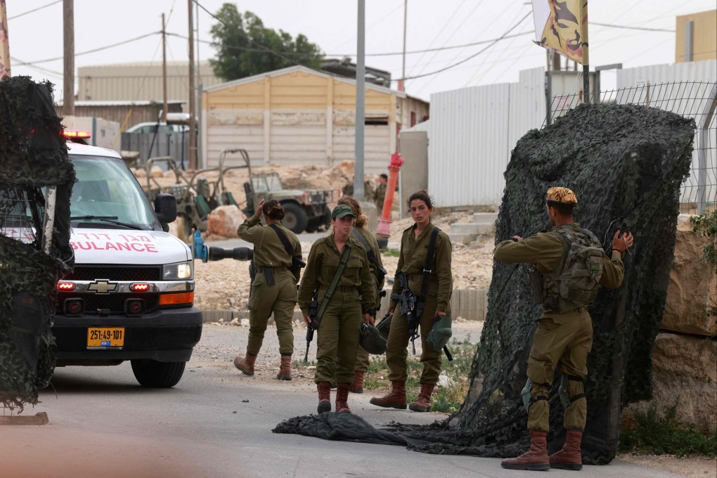 An ambulance near the Israeli Mount Harif military base close to the city of Mitzpe Ramon in Israel’s southern Negev desert, adjacent to the border with Egypt, on Saturday. Photo: AFP