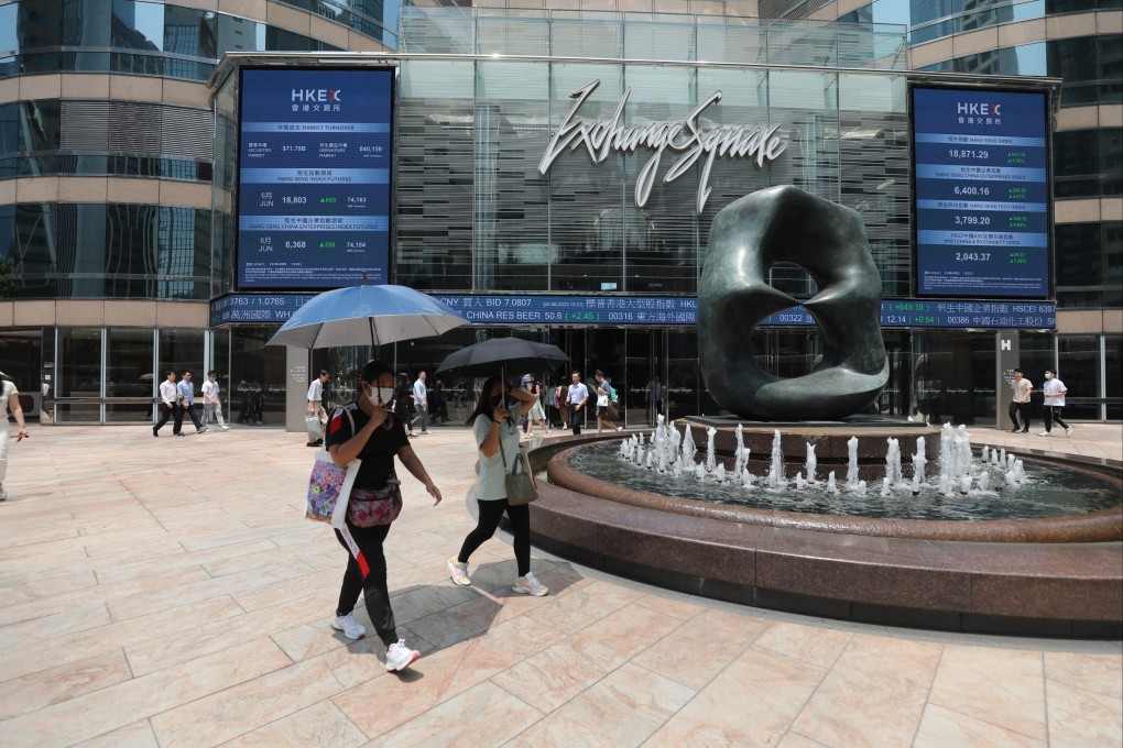 People walk through Exchange Square in Central, Hong Kong, on June 2. Introducing taxation on capital income or a higher salaries tax would undermine the city’s attractiveness as an international financial centre. Photo: Xiaomei Chen