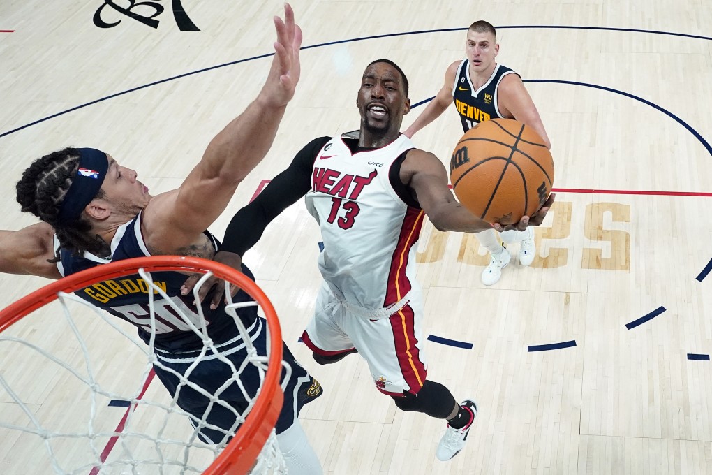 Miami Heat’s Bam Adebayo drives to the basket against Aaron Gordon of the Denver Nuggets during the second half in Game Two of the 2023 NBA Finals at Ball Arena in Denver. Photo: TNS