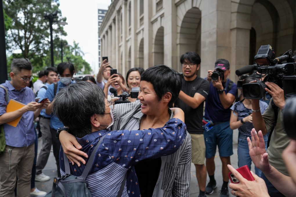 Hong Kong freelance producer Bao Choy (centre) embraces supporters after her appeal win. Photo: Elson Li