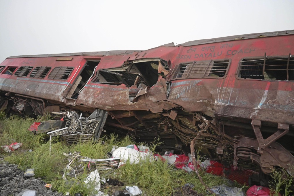 A destroyed train car left at the site of a deadly multiple-train crash in the eastern Indian state of Odisha. Photo: Kyodo