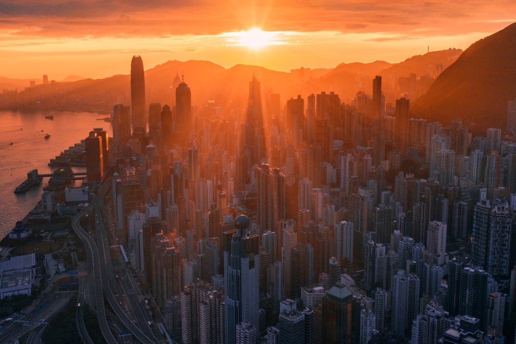 A drone’s-eye view of Hong Kong’s Central district and Victoria Harbour at dawn. Photo: Shutterstock