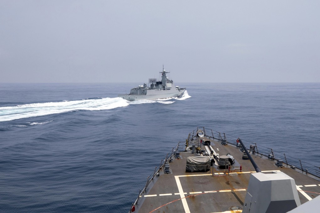 The close encounter between a Chinese navy ship (top) and the USS Chung-Hoon in the Taiwan Strait on Saturday shows why the two countries need to maintain communication, according to a US representative. Photo: US Navy via AP