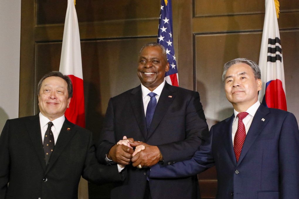 Japanese defence chief Hamada Yasukazu (left), his US counterpart Lloyd Austin and South Korean defence chief Lee Jong-sup meet on the sidelines of the Shangri-La Dialogue in Singapore on Saturday. Photo: EPA-EFE