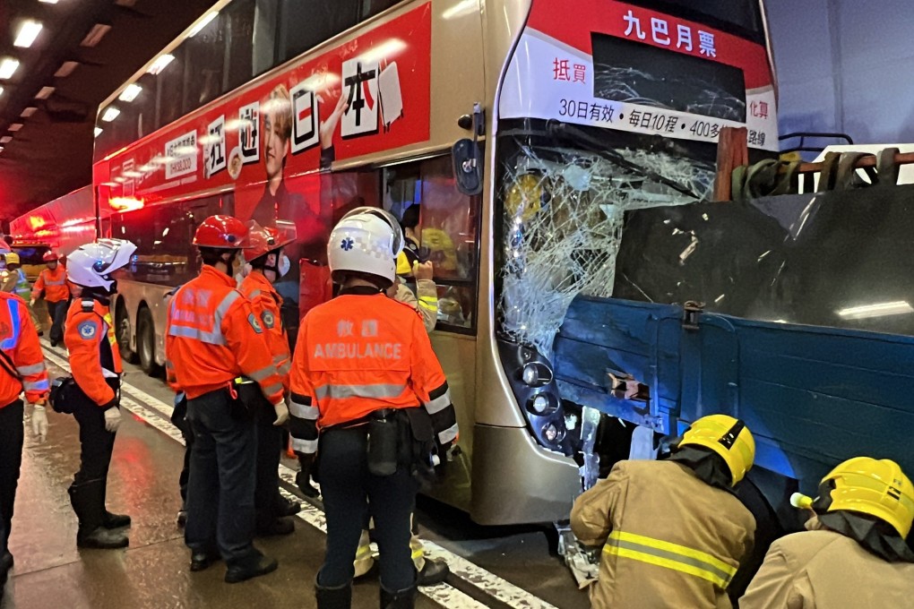 Emergency personnel try to free the trapped bus driver in the tunnel. Photo: Handout
