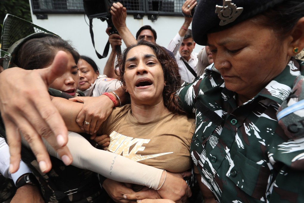Top Indian wrestler Vinesh Phogat is detained by the police on May 28 during a protest march in New Delhi. The wrestlers’ cause has drawn support from student groups, farmers, Indian athletes and the International Olympic Committee. Photo: EPA-EFE