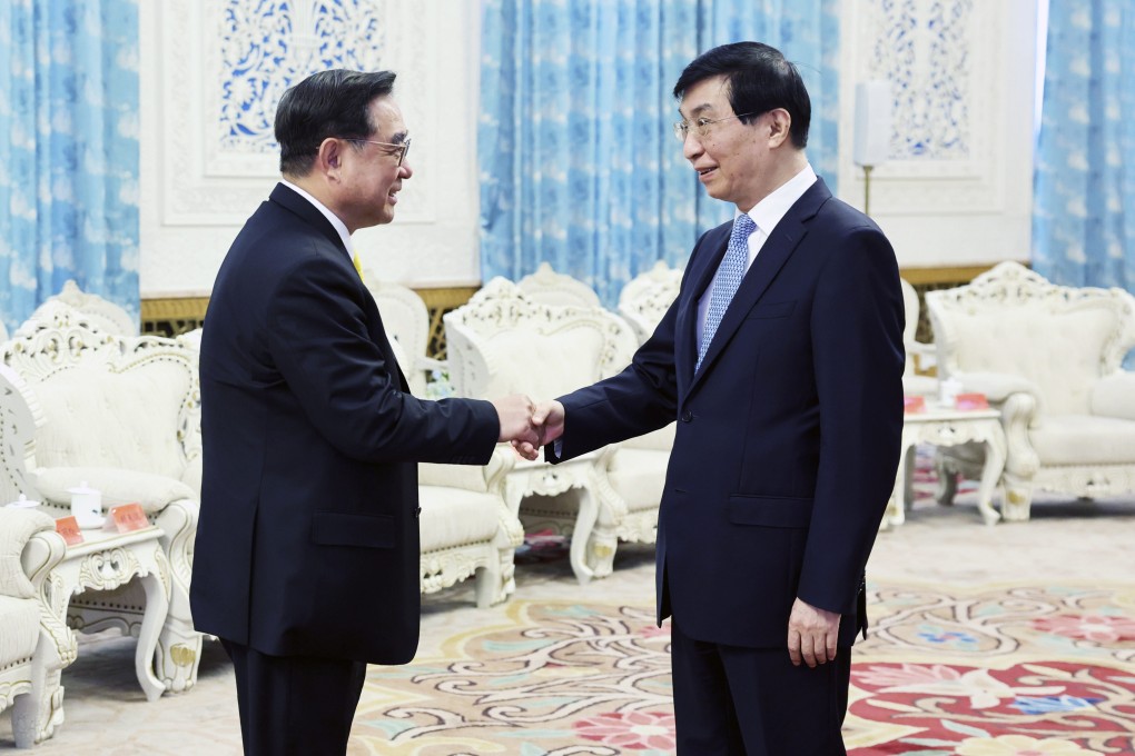 Wu Cherng-dean (left), leader of Taiwan’s New Party, meets Politburo Standing Committee member Wang Huning in Beijing on Monday. Photo: Xinhua