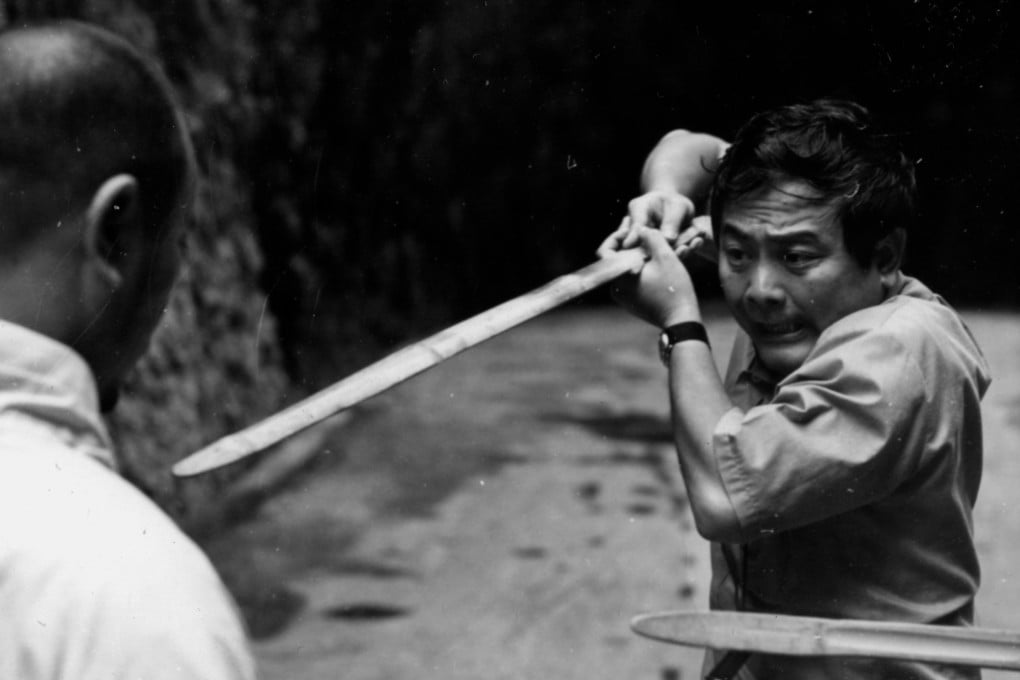 King Hu pictured on a film set, in a still from the documentary “The King of Wuxia Part 1: The Prophet Was Once Here” (category IIA, Mandarin, Cantonese, English), directed by Lin Jing-jie.