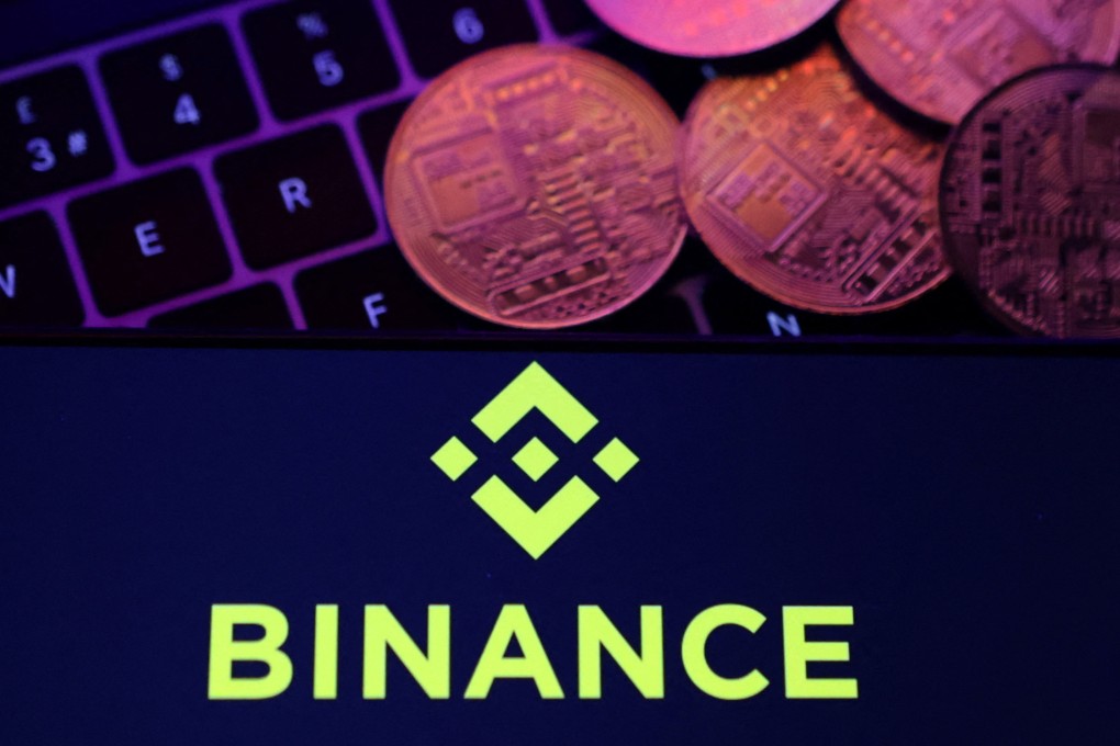 The Binance logo and a representation of cryptocurrencies are placed on a keyboard in this photo illustration taken November 8, 2022. Photo: Reuters