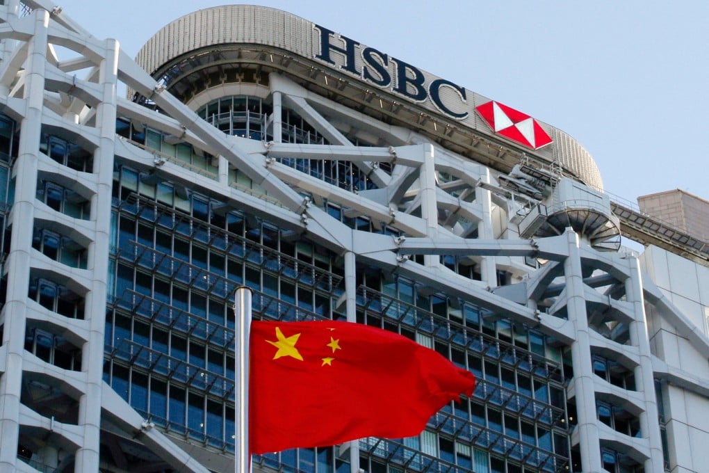 A Chinese national flag flies in front of the HSBC headquarters in Hong Kong. Photo: Reuters