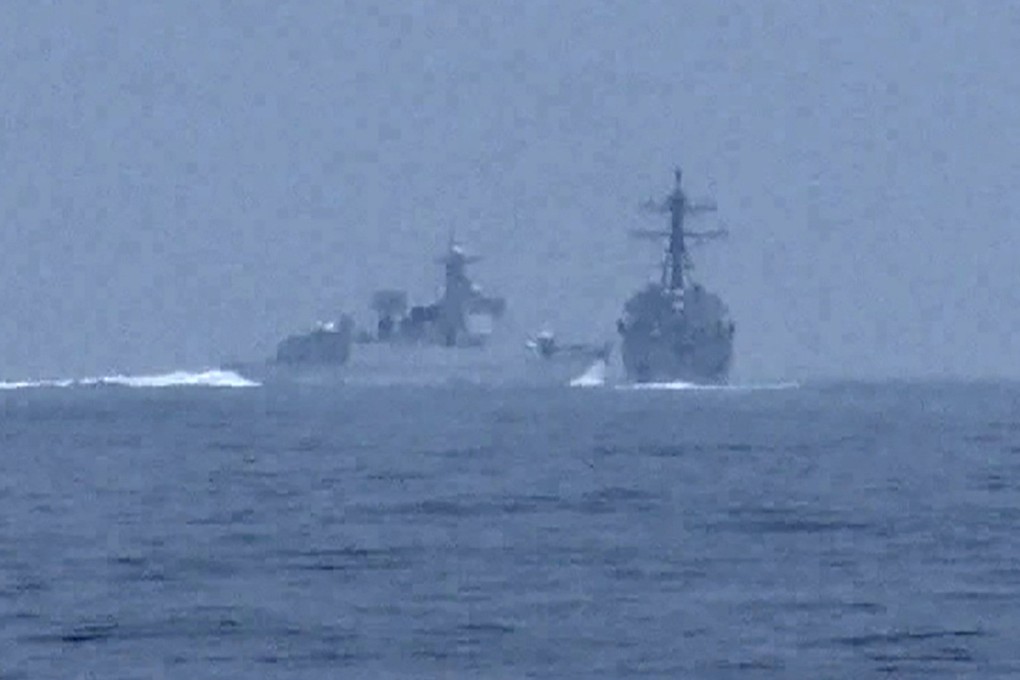 A Chinese warship, identified by the US Indo-Pacific Command as PRC LY 132, crosses the path of the US Navy destroyer Chung-Hoon in the Taiwan Strait on Saturday. Photo: Global News via Reuters