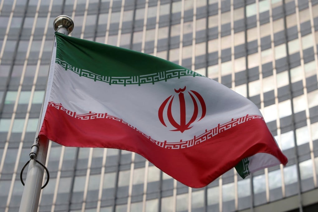 The Iranian flag flutters in front of the International Atomic Energy Agency headquarters in Vienna, Austria on Monday. Photo: Reuters