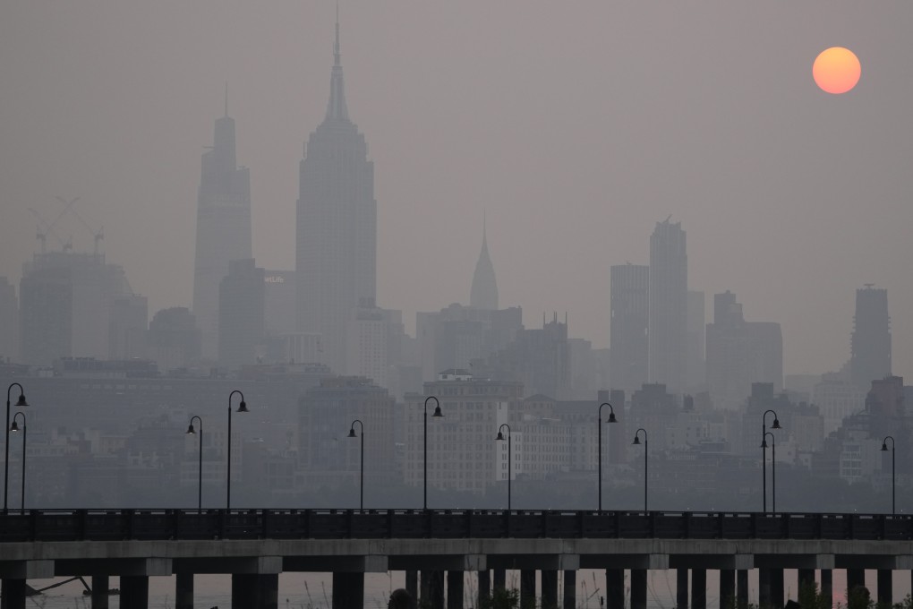 The sun rises over a hazy New York City skyline as intense Canadian wildfires are blanketing the northeastern US. Photo: AP