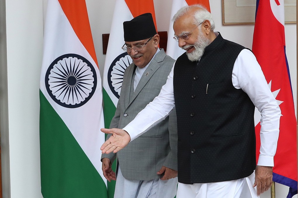 Nepal’s Prime Minister Pushpa Kamal Dahal (left) chats with Indian Prime Minister Narendra Modi prior to their meeting at Hyderabad House, in New Delhi, India, on June 1, 2023. Photo: EPA-EFE