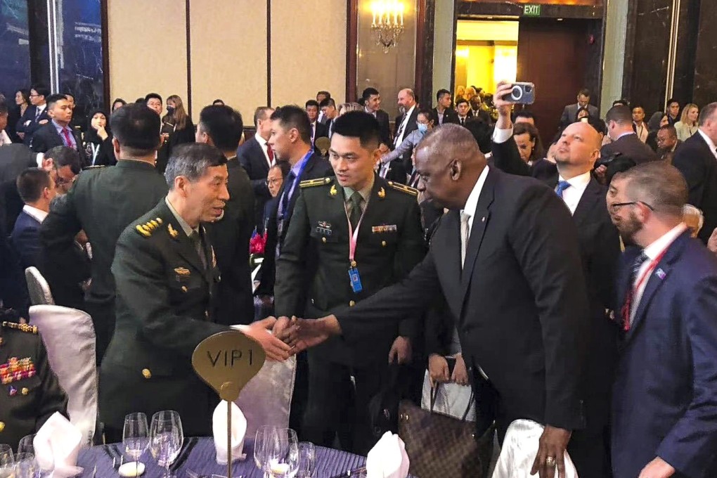China’s defence chief, General Li Shangfu, shakes hands with US Secretary of Defence Lloyd Austin at the opening dinner of the Shangri-La Dialogue, an annual defence and security forum, in Singapore, on June 2. The two did not schedule a meeting. Photo: Weibo