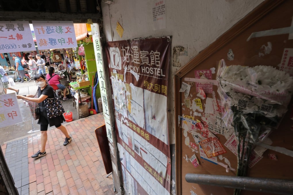 People lay flowers where three girls aged two, four and five were found dead at 115 Kweilin Street in Sham Shui Po. The girls’ mother has been charged with murder. Photo: Jelly Tse