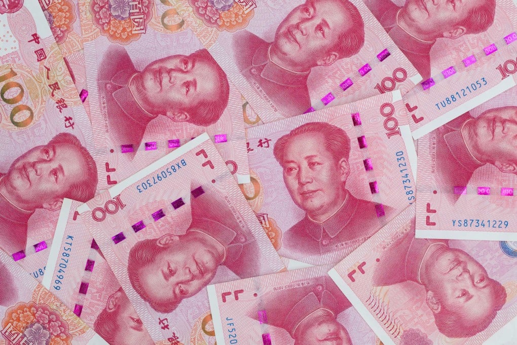 Chinese one-hundred yuan banknotes are arranged for a photograph in Hong Kong, China, on Thursday, April 23, 2020. The People’s Bank of China (PBOC) has cut short- and medium-term rates recently on top of liquidity injections, loan rollovers and easier regulatory rules. Photo:Bloomberg