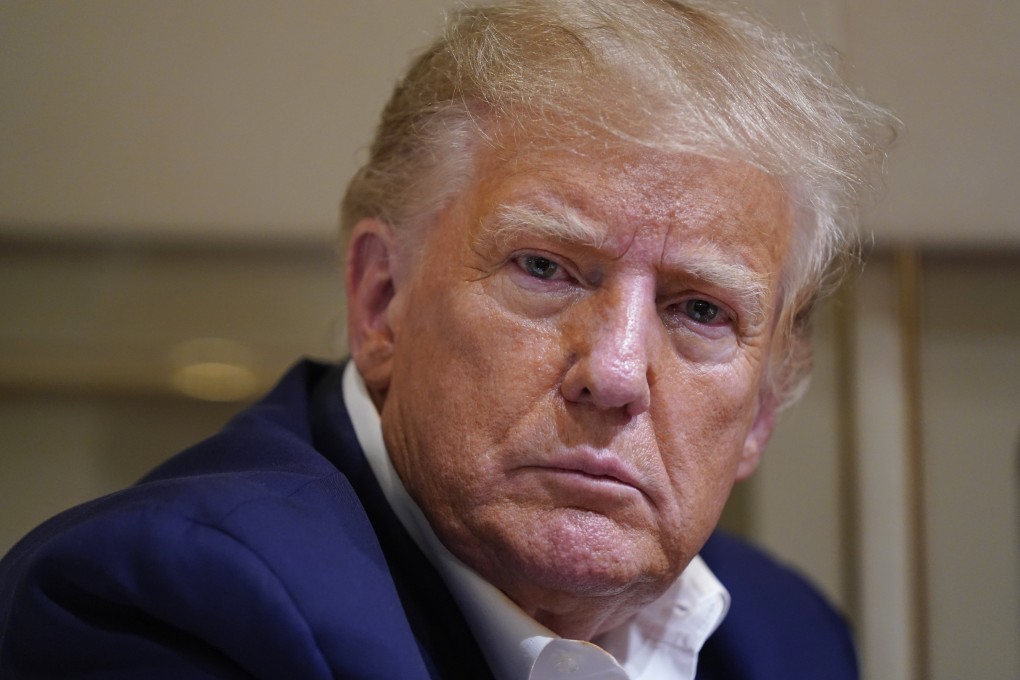 Former US president Donald Trump is seen on his plane after a campaign rally at Waco Regional Airport in Texas in March. Photo: AP