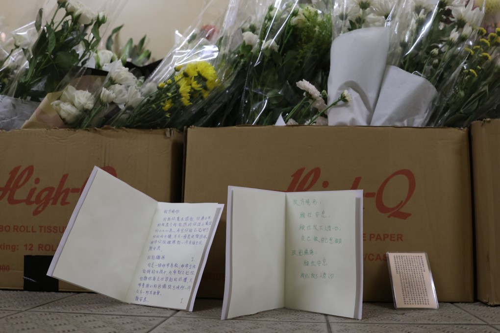 People place flowers and leave notes at the shopping mall where two women were killed on June 2 by a mentally disturbed man. Photo: May Tse