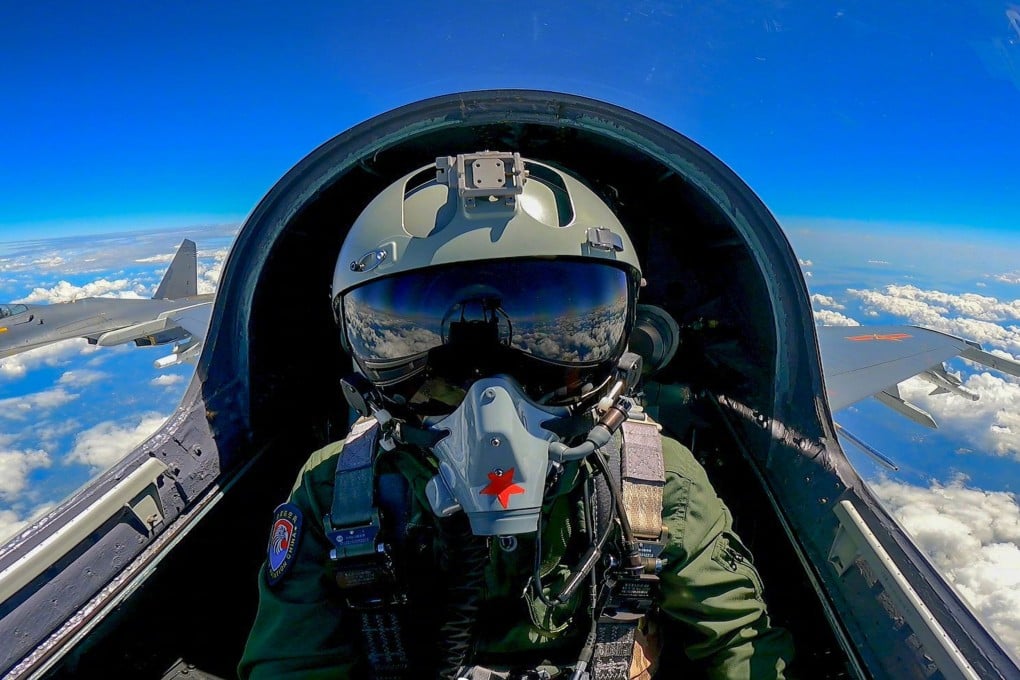 A Chinese People’s Liberation Army pilot flies a fighter plane during the “Joint Sword” military exercises in April. Photo: Military Department of China National Radio
