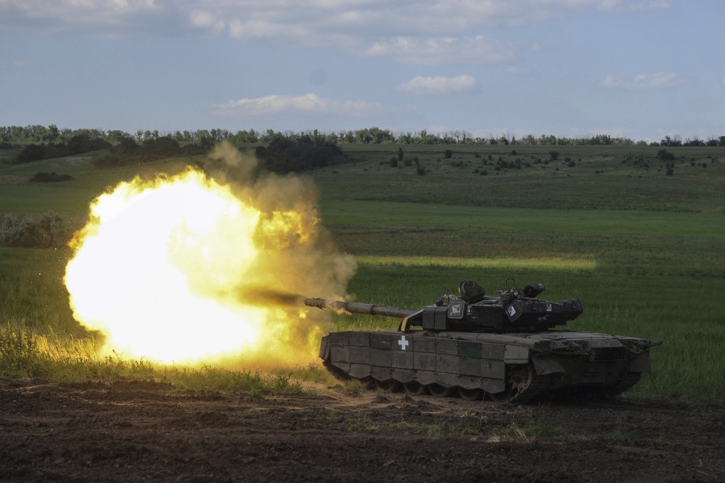 A Ukrainian tank fires in Chasiv Yar, Ukraine, on Wednesday. Photo: Iryna Rybakova via AP