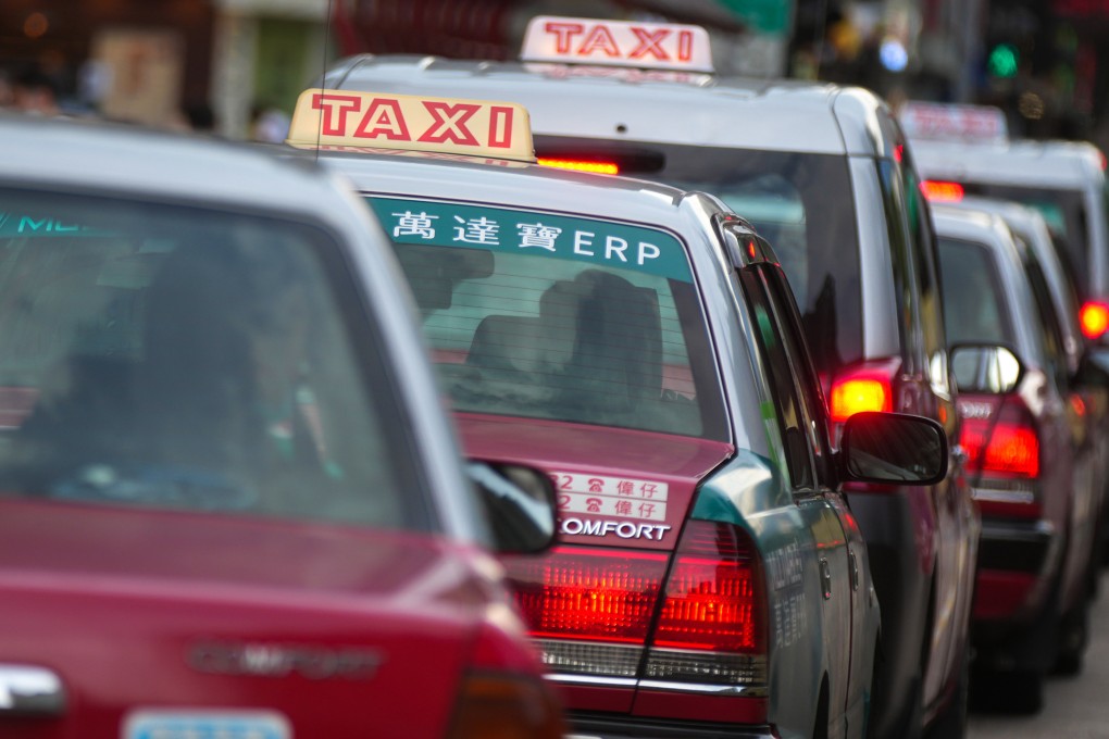 Taxi drivers wait for business in a taxi station in Tai Wai, Hong Kong. Photo: Sam Tsang