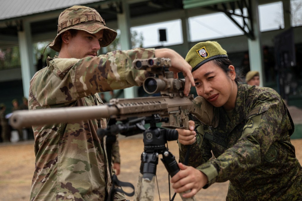 A Filipino soldier practices holding a weapon as part of the annual US-Philippines joint military exercises in the Philippines in April. Photo: Reuters