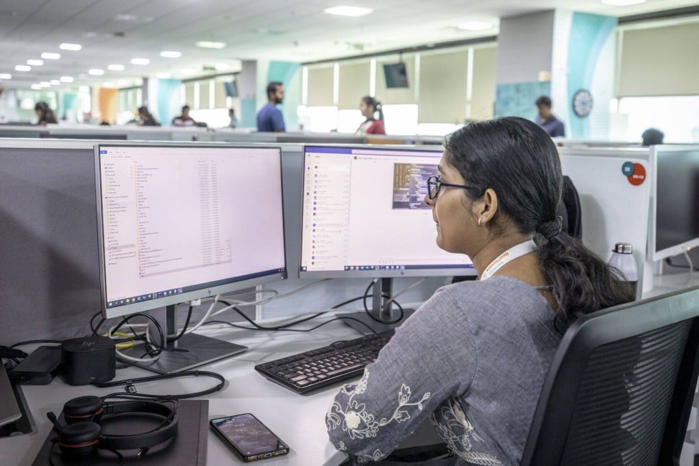 Workers are seen at the Siemens Healthineers AG global capability centre in Bangalore earlier this year. Across India, the offices set up by multinationals to provide cheap operational support are now taking on more sophisticated roles. Photo: Bloomberg