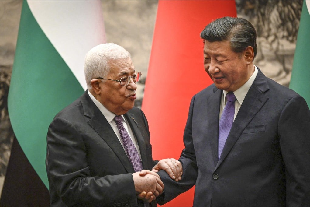 Palestinian Authority president Mahmoud Abbas (left) shakes hands with Chinese President Xi Jinping after a ceremony in Beijing on Wednesday. Photo: AFP