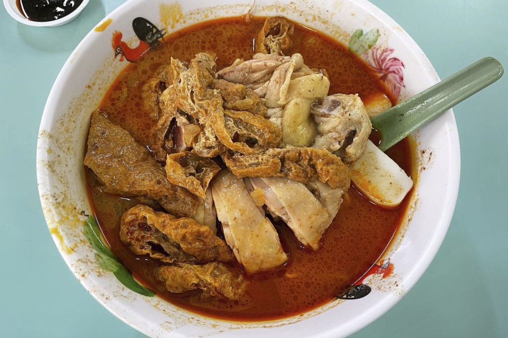 Chicken curry noodles from Hong Lim Market & Food Centre’s Heng Kee. It is one of 17 hawker stalls that have been newly awarded a Bib Gourmand in the Michelin Guide Singapore 2023. Photo: Instagram/@lordq14