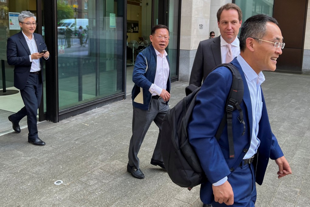 Zhang Li (centre), co-chairman and CEO of Chinese developer Guangzhou R&F Properties, leaves Westminster Magistrates’ Court in London on Wednesday. Photo: Reuters
