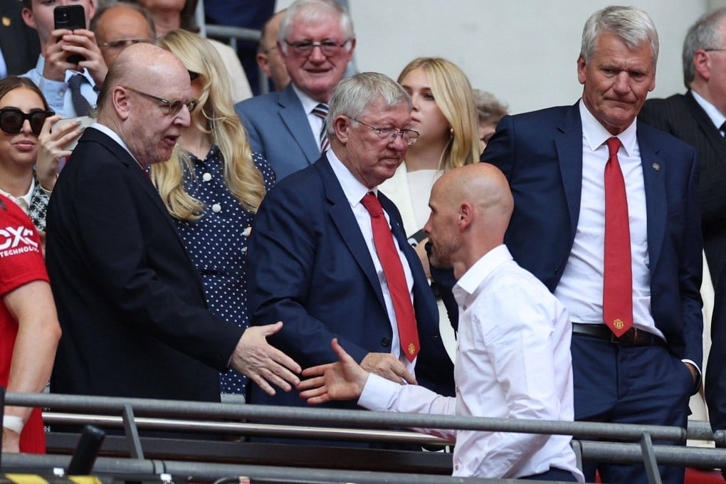 Manchester United co-owner Avram Glazer (left), former manager Sir Alex Ferguson and ex-chief executive David Gill shake hands with manager Erik ten Hag after the English FA Cup final loss to Manchester City at Wembley Stadium in London on June 3. Photo: AFP
