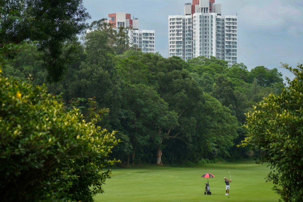 A golfer on the Old Course at the Hong Kong Golf Club on June 13. Under its redevelopment plan, the government will take back 32 hectares of land from the club, including nine hectares earmarked for public housing. Photo: Elson Li