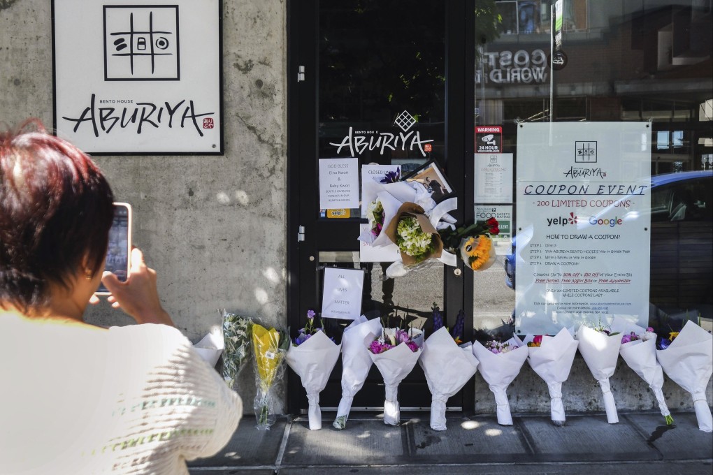 Mourners placed flowers and other remembrances at the now-closed Aburiya Bento House sushi restaurant in Seattle, US. Photo: The Seattle Times via AP