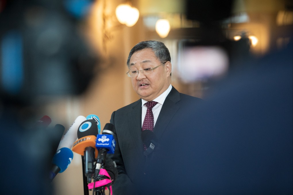 Fu Cong, China’s ambassador to the European Union, speaks to the media. Photo: AFP